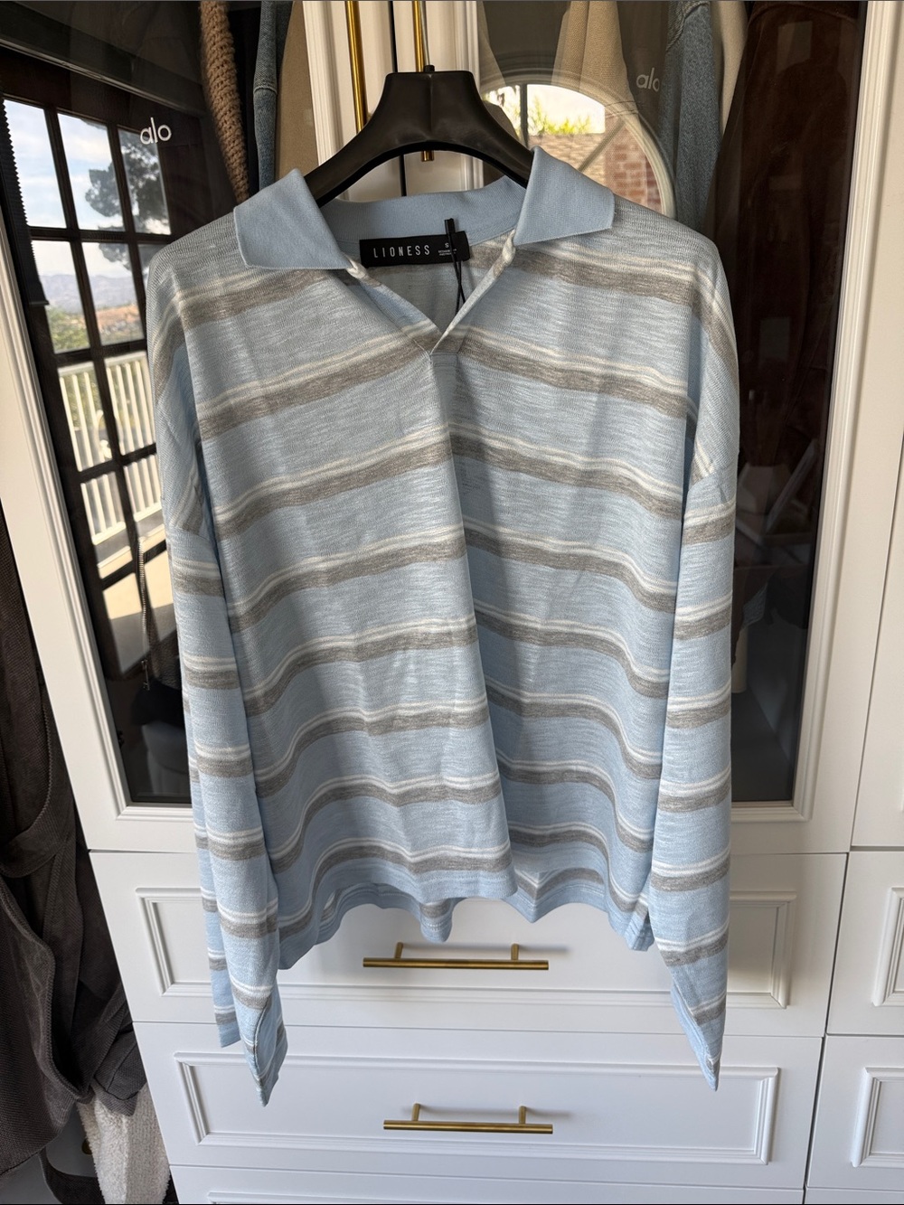 Lioness Pale Blue and Gray Striped V‑Neck Polo Sweater